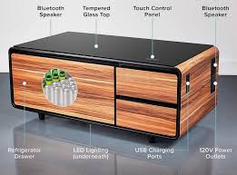 Other notable features of the smart coffee table? The Ultimate Coffee Table With Built In Fridge And Speaker System