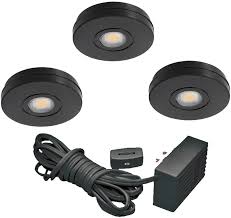 However, the kit comes with a track and cover to keep the cord out of sight, which is stuck under the cabinet with a 3m type adhesive. Juno Lighting Uk3stl 3k Bl 31465 3 Piece Black 12v Led Solo Task Undercabinet Puck Light Kit Led Recessed Puck Lights At Green Electrical Supply