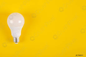 Led Light Bulb Composition On Yellow Background Stock Photo Crushpixel