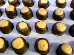 Best Buckeyes Peanut Butter And Chocolate Candies Chocolate Candy Recipes Buckeyes Recipe Candy Recipes