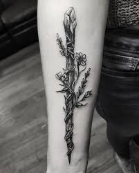 Here are a few inspirations!. Tattoos Tattooideas Blackandwhite Blackworktattoo Wandtattoo Harrypotter Flowertattoodesigns Witchcraft Wit Wand Tattoo Tattoos Flower Tattoo Designs