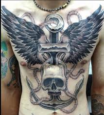 Deeper meanings can be expressed by the types of wings you choose. Skull Anchor And Wings On Chest Tattoo Ideas Center