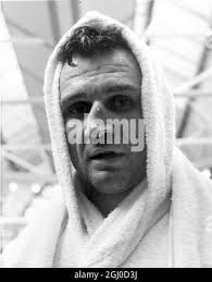 The World Middleweight champion, Paul Pender of Boston is sweating after a  training session in preparation for his fight against Briaitn's Terry  Downes. 10th July 1961 Stock Photo