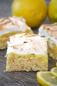 These Lemon Meringue Rice Krispie Treats With Their Lemony Rice Krispies Crust Fresh Lemon Curd And Toasted Me Rice Krispie Treats Crispy Treats Lemon Recipes