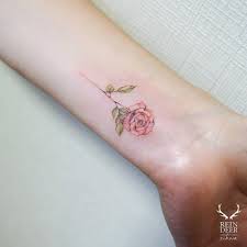Acquiring a small flower tattoo has grown in popularity for girls who aren't ready to commit themselves to a giant one on their arms or back. Rose Tattoo On The Wrist