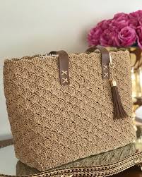 Yeni Bir Modelle Donduysem Demekki Kagit Ipten Canta Sezonu Acilmistir Model Shellstitch Crochet Purse Patterns Crochet Bag Crochet Bag Pattern