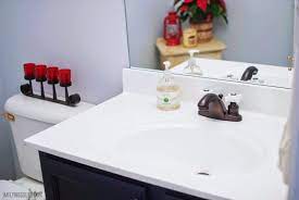 Countertops made of crushed glass are a relatively new introduction, but they are steadily becoming more popular. Remodelaholic Painted Bathroom Sink And Countertop Makeover