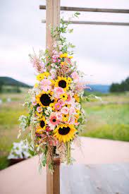 5 out of 5 stars. Arch Spray Of Pink And Yellow Featuring Sunflowers Gerber Daisies Ranunculus And Roses Casamentos De Girassol Decoracoes De Casamento Girassol Wedding Decor
