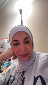 Old Muslim Lady in Store