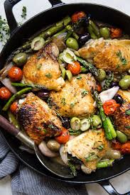 Baked Chicken Thighs With Asparagus The Modern Proper Recipe Dutch Oven Chicken Oven Chicken Recipes Pan Chicken Thighs