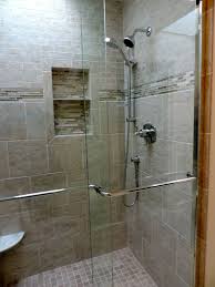 Larger Standup Shower Idea With Frameless Glass Door And Wall Mounted Showerhead And Handheld Showerhead Bui Shower Remodel Small Shower Remodel Shower Shelves