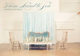 Beach themed wedding table decorations. From Land To Sea Beach Wedding Ideas