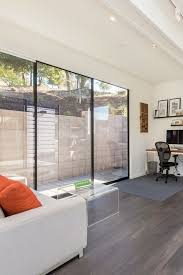 Large Aluminum Sliding Glass Doors That Open The Outside View And Flood The Room With Natura Sliding Glass Doors Patio Glass Doors Patio Sliding Doors Exterior