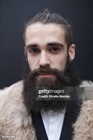 Joel Jay-P Stylist and Model wearing Dent de Man suit, white Uniglo... News  Photo