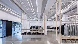 Clothing racks are a great way to bring style and function to a bedroom or entryway. Clothing Racks Move Along Wheeled Tracks In La Store Reigning Champ