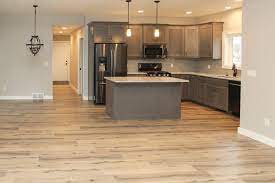 All of our laminate flooring ranges are durable and easy to fit, with many styles to suit any taste. Light Wood Looking Laminate Kitchen Floor Laminate Flooring In Kitchen Laminate Kitchen Flooring Laminate Kitchen