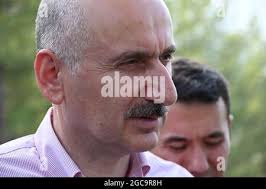 07 August 2021, Turkey, Köycegiz: The helper Deniz Demirbas has been