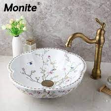 What are the shipping options for brushed nickel bathroom accessories? Monite Art Ceramic Basin Spring Blossoms Design Washbasin Bathroom Sink Set Antique Brass Water Mixer Tap Faucet W Pop Up Drain Bathroom Sinks Aliexpress Antique Faucet Basin Faucet Style