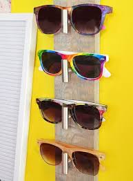 Huffingtonpost.com leather cording sunglasses holder full tutorial: Wall Hung Sunglasses Organizer Dream A Little Bigger