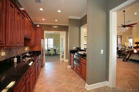 Choose wall colors that enhance cherry. Cherry And Gray Cherry Cabinets Kitchen Cherry Cabinets Kitchen Wall Color Kitchen Wall Colors