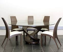 19 Magnificent Modern Dining Tables You Need To See Right Now Modern Dining Table Dining Table Chairs Unique Dining Tables