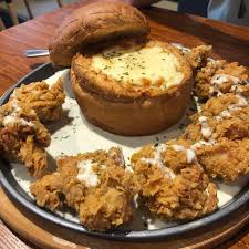 This korean fried chicken is crispier than most american versions as it is fried twice. I Ate Korean Fried Chicken With A Melted Cheese Bread Bowl Food Food Melted Cheese Bread Korean Fried Chicken