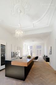 poggenpohl kitchen ijkelenstam keukens showroom gorinchem ornamenten plafond mat zwart keuken rvs blad w keuken vloeren moderne keukens keuken ontwerpen