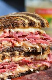 Reuben Sandwich Perfect Combination Of Warm Corned Beef Melted Swiss Cheese Sauerkraut Thousand Island Dressing And Cru Reuben Sandwich Sandwiches Recipes
