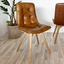 We did not find results for: Allegro Brown Leather Oak Dining Chairs Pair Modish Living