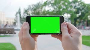 May 07, 2021 · when the phone call shows up on your screen, if you have a touch screen phone, then you click the answer button. Two Hands Holding A Phone With A Green Screen In A Horizontal Stock Photo Picture And Royalty Free Image Image 114346532