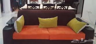 طقم كنب لون برتقالي وبني للبيع