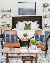 The Damon Bed Dominic Saddle Accent Chair Pair So Nicely In This Modern Eclectic Bedroom Photo In 2020 Eclectic Bedroom Bedroom Seating Area Modern Eclectic Bedroom