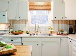 Work in a small area at a time, adding adhesive and tile until you reach the top of the area to be tiled. Do It Yourself Diy Kitchen Backsplash Ideas Hgtv Pictures Hgtv