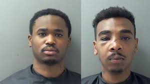 Two arrests made in shooting death of store clerk during robbery, police  chief says