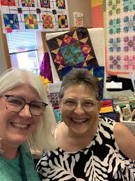 Hi all, I think I remember a bison fabric in one of the South Dakota shops  (bison head-cartoonish, green backgrounnd). If you know the fabric and  where I saw it I'd be