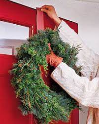 How To Hang A Wreath Without Making Holes In The Door How To Hang A Wreath Holiday Wreaths How To Hang Wreath