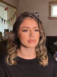 Who can do makeup for my engagement photos in Chicago?