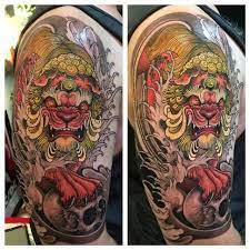 12 Japanese Lion Tattoo Designs And Ideas Petpress Japanese Lion Tattoo Design Japanese Lion Tattoo Lion Tattoo