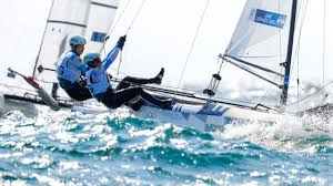 Argentine santiago lange, who lost part of a lung to cancer last year, teams up with cecilia carranza saroli to win nacra 17 mixed gold. Eih10byfgx1xkm