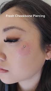Fresh cheekbone dermal piercing with a 2mm bezel. So cute and subtle. DM me  if you have any questions. I'll be in orange today through Friday and back 