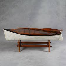 A coffee table and a storage trunk in one! Boat Coffee Table Original And Eye Catching Furniture Piece For Your Home