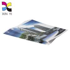 The staples are clamped in the centre. Book Printing High Quality Staples Booklet Printing Binding Xinyi Printing