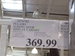 It features a mirrored back, adjustable glass shelves and a brown cherry finish. Pulaski Display Cabinet Costcochaser