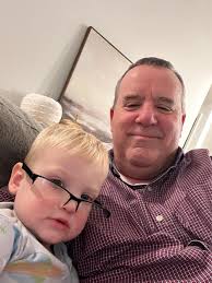 Just Louie and best friend John Goodman enjoying some baseball no big deal.