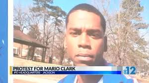 Family members of Mario Clark hold protest at JPD headquarters