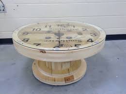 A Cable Wire Spool Made Into A Coffee Table Clock Wooden Cable Spools Wooden Spool Projects Spool Furniture
