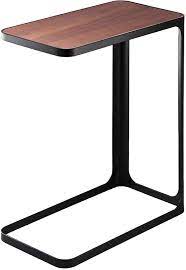 This range of white and black steel tables offer modern shapes that fit seamlessly with any contemporary interior design. Amazon Com Yamazaki Home C Shape End Couch Compact Side Table One Size Black Furniture Decor