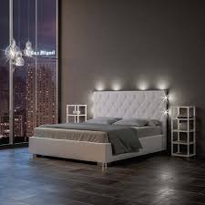 Letto una piazza e mezza book è il pratico letto che ti permette di arredare con stile la tua camera da letto senza rinunciare ai contrasti cromatici che si creano fra la testata e la parete. Stella Letto Matrimoniale Con Contenitore In Similpelle Bianco Con Luci A Led Collyshop