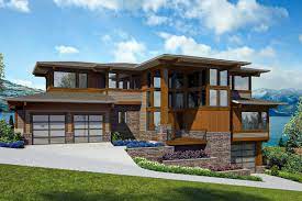 Plan 23812jd Modern Prairie House Plan For A Side Sloping Lot In 2021 Sloping Lot House Plan Prairie House Modern House Plans