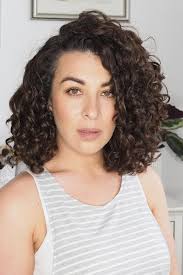 Styling frizzy hair in high humidity can be a challenge. Protein Moisture Balance Curly Cailin